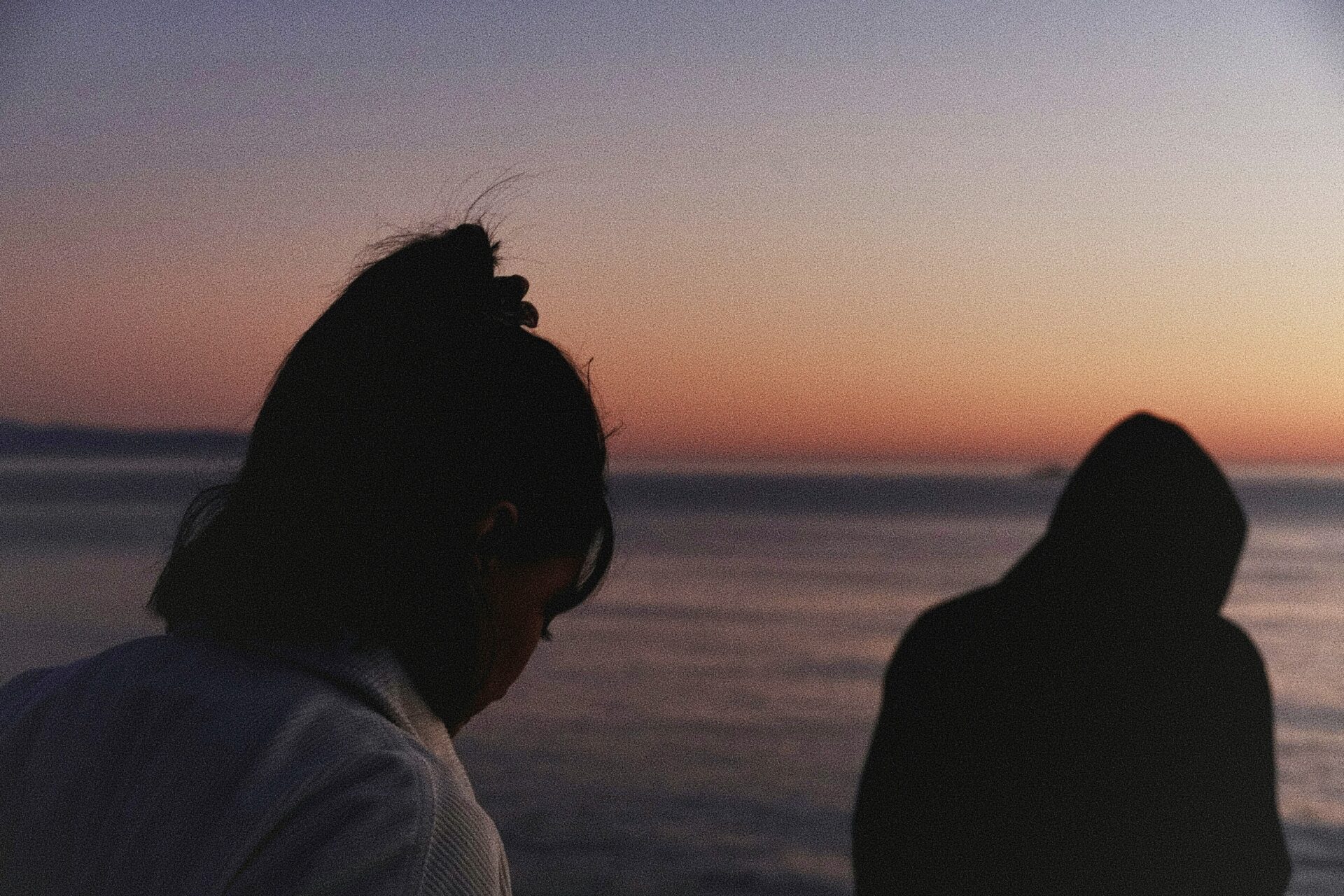 People on beach sunset